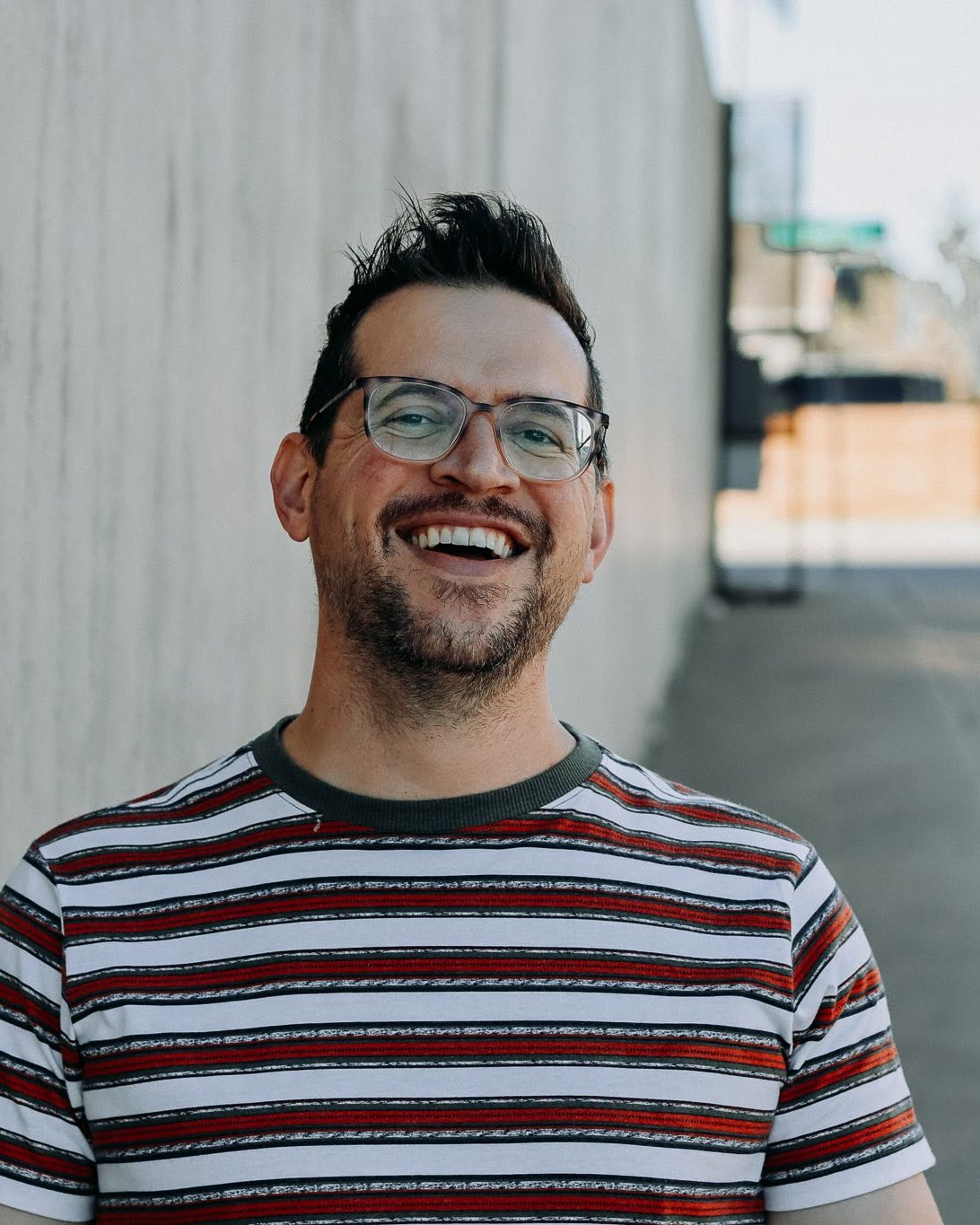 Portrait of Dave Koenig laughing outdoors